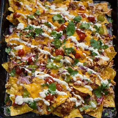 Irresistible Loaded Chicken Nachos : A Flavor-Packed Family Favorite